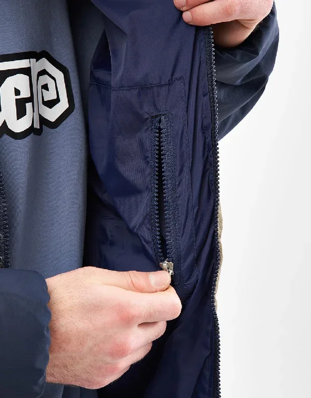 butter-goods-puffer-jacket-navy-001164411