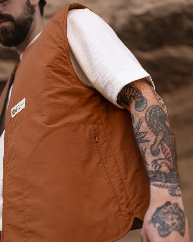 fern-quilted-reversible-liner-vest-rust