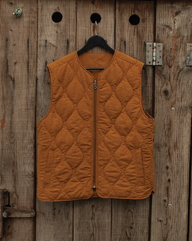 fern-quilted-reversible-liner-vest-rust