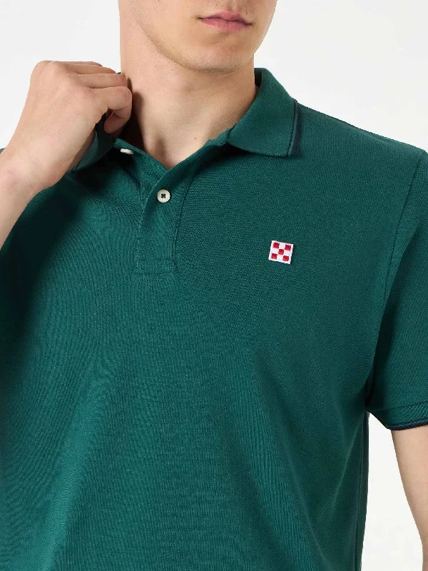 green-piquet-polo-with-st-barth-check-logo